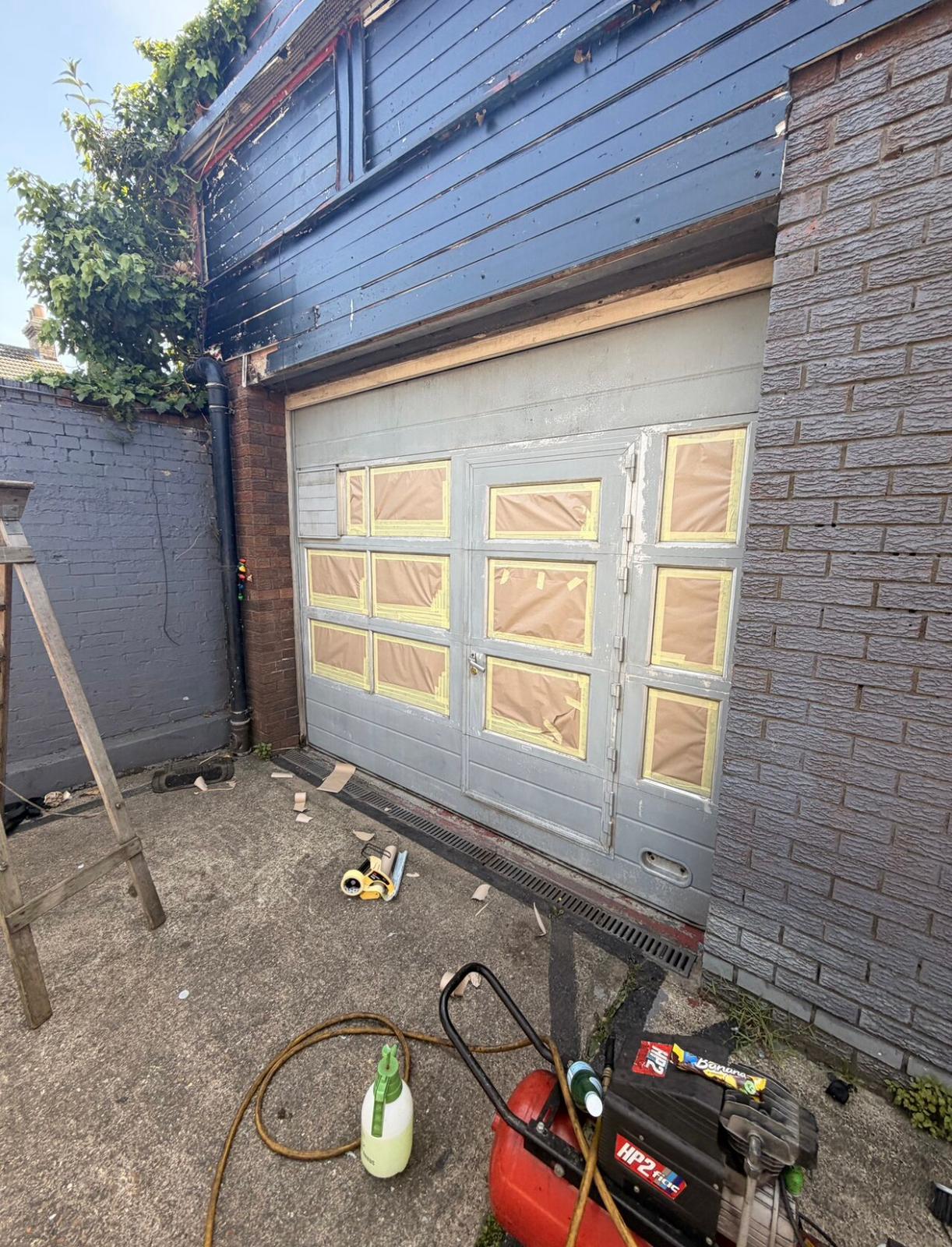 Sprayed garage door — prep